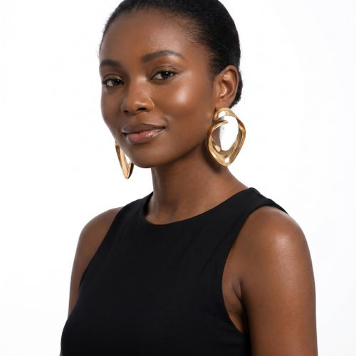 Gold Twisted Sculptural Statement Earrings Gold Twisted Sculptural Statement Earrings